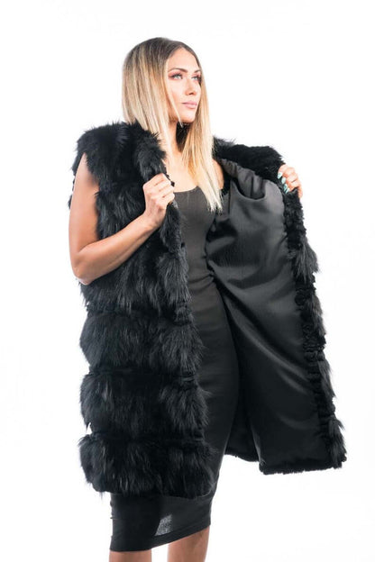 Fox Fur Vest Long Black - Tatifurs worn by a model, showcasing luxury and elegance with soft black rabbit fur accents.