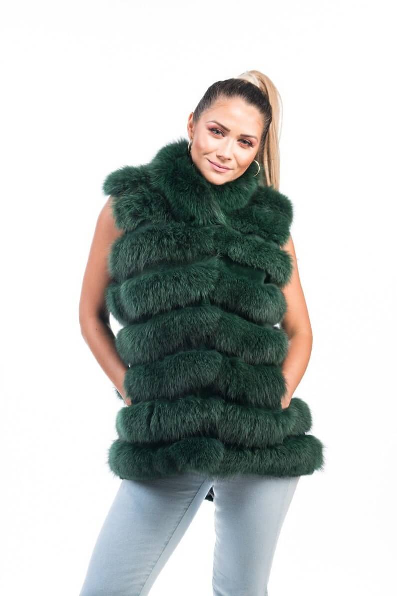 Green Fox Fur Vest Full Skin - Tatifurs worn by a model, showcasing its vibrant color and luxurious design.