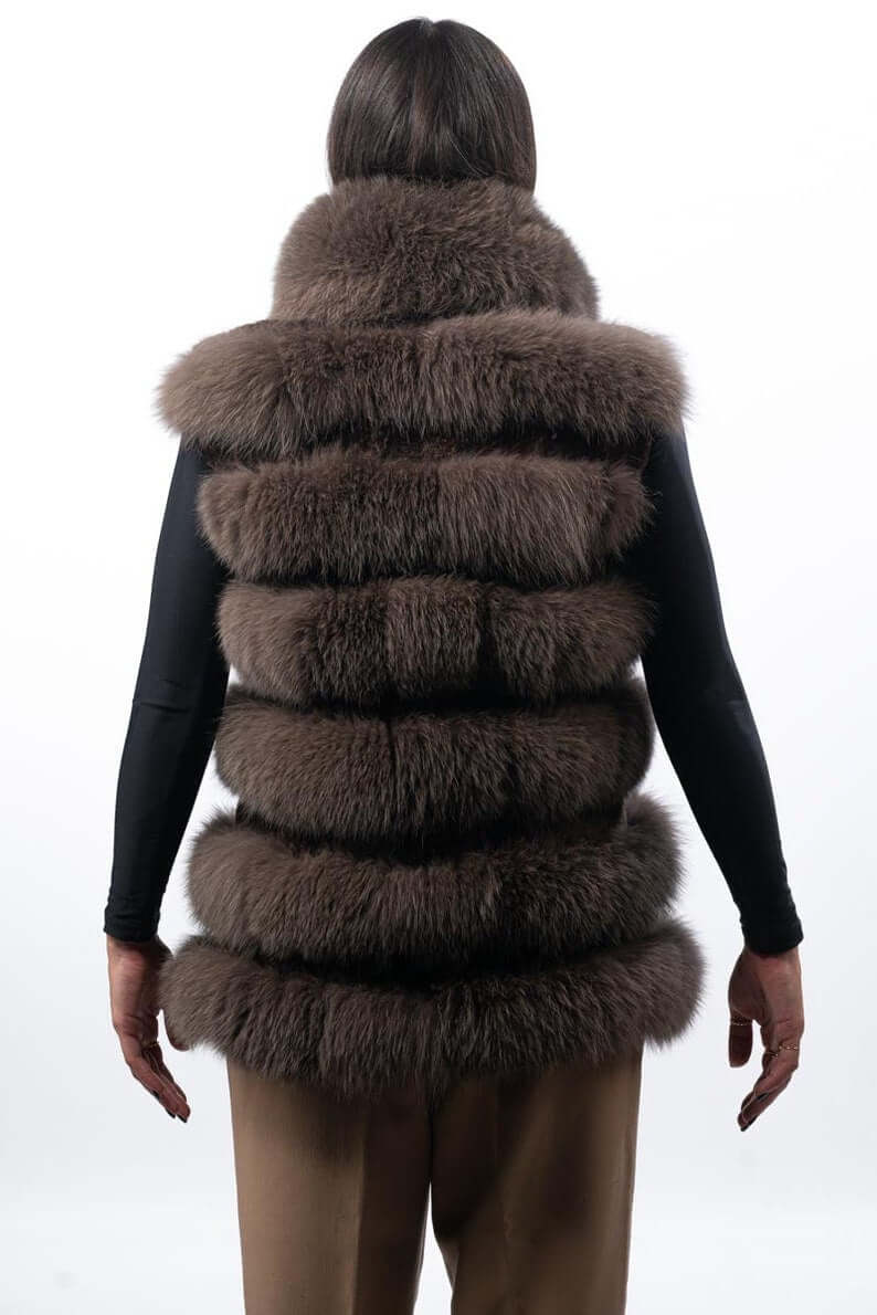 Fox fur vest brown close-up texture showing full skin brown fox pile and horizontal rabbit fur trim strip construction between fox rows — Greek craftsmanship, TatiFurs
