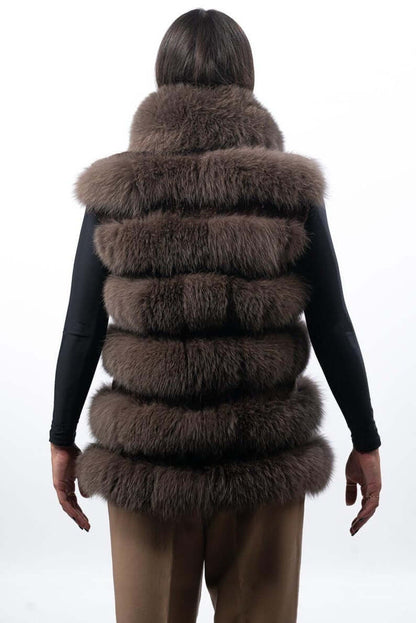 Fox fur vest brown close-up texture showing full skin brown fox pile and horizontal rabbit fur trim strip construction between fox rows — Greek craftsmanship, TatiFurs
