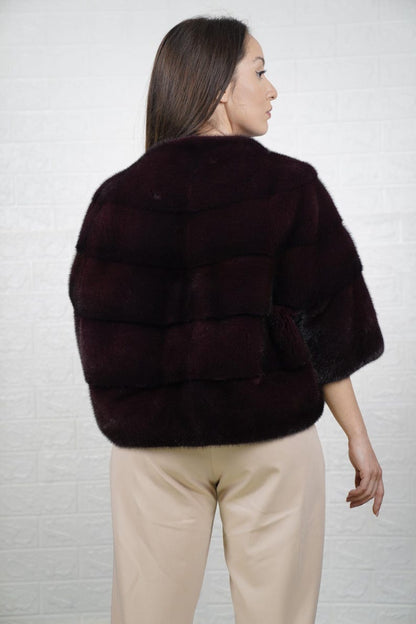 Woman wearing burgundy mink fur bomber jacket full skin – luxury Greek craftsmanship
