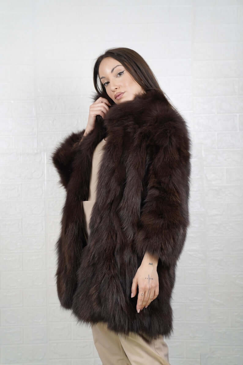2. Woman wearing luxury brown fox fur jacket with statement collar
