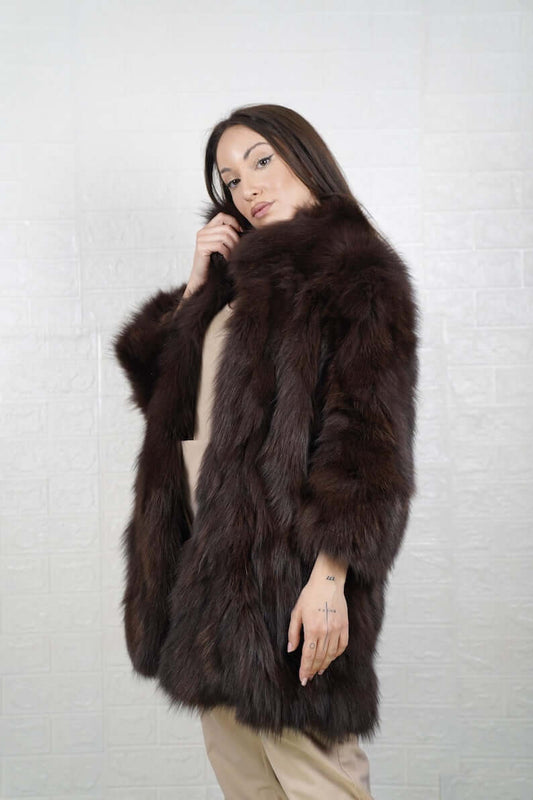 2. Woman wearing luxury brown fox fur jacket with statement collar
