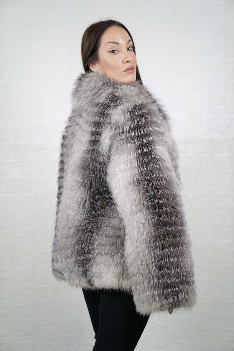 Frost fox fur coat styled for elegant winter city wear
