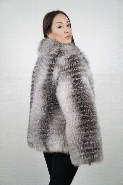 Frost fox fur coat styled for elegant winter city wear
