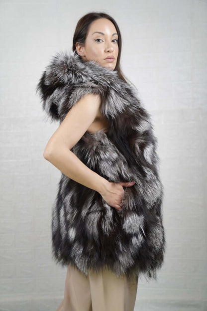 Fox Fur Vest Silver Long Coat Jacket Hooded - Tatifurs showcased by a model with a dramatic hood.