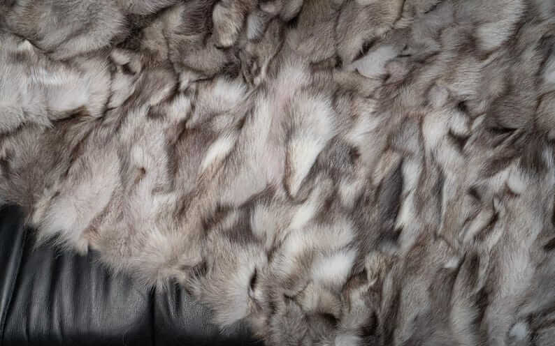 Fox Fur Blanket Throw Blue Natural Dark - Tatifurs fabric close-up showcasing luxurious textures.