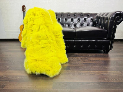 fox fur throw blanket yellow — draped across white sofa, yellow luminosity against clean base — Greek craftsmanship, TatiFurs
