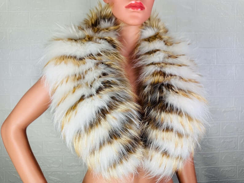 Fox fur collar white gold close-up texture showing white fox and gold fox alternating strips pile depth and luminous precious contrast — Greek craftsmanship, TatiFurs
