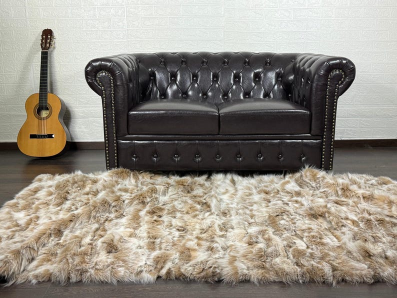 fox fur throw blanket beige — warm beige surface, white accent panels, quiet precise contrast — Greek craftsmanship, TatiFurs
