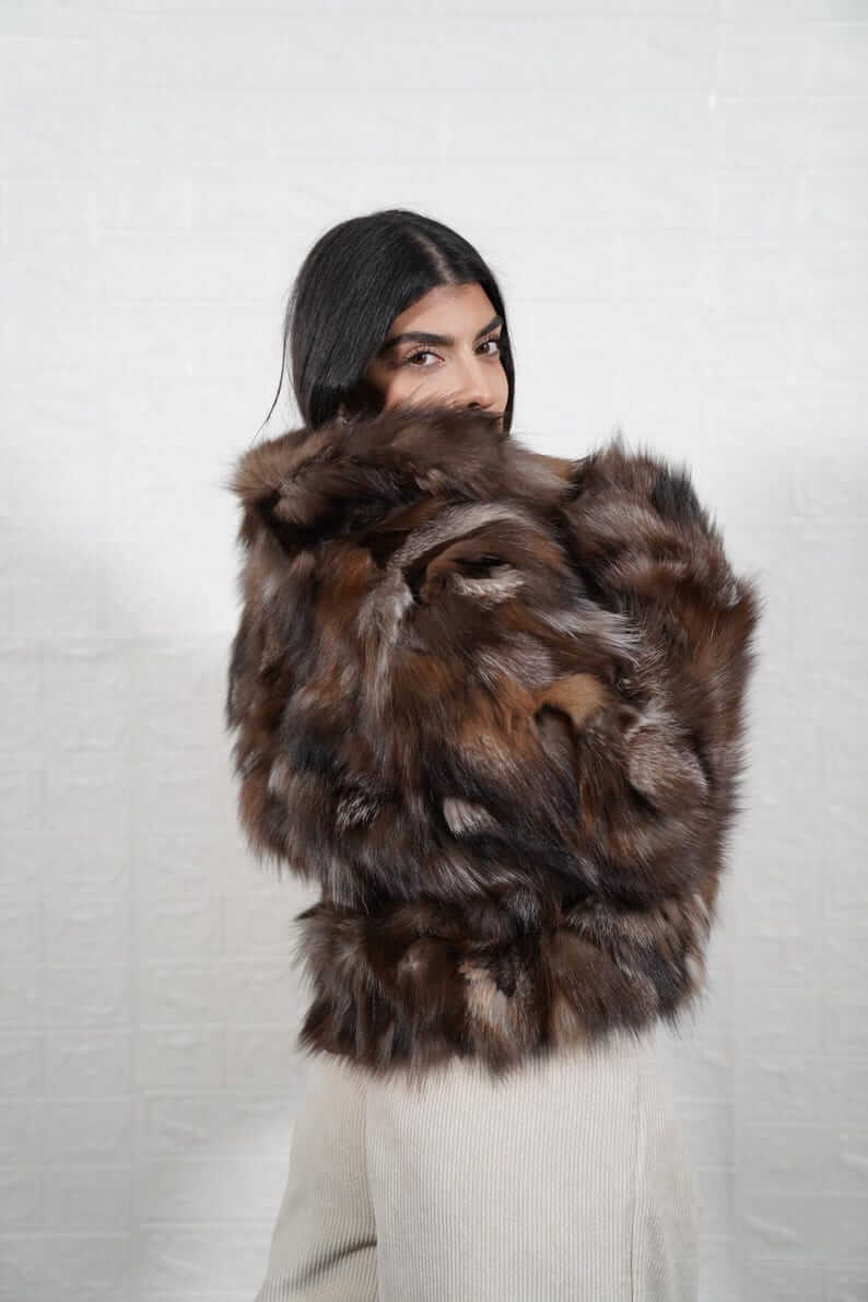 Fox Fur Jacket Crystal Natural – Luxury - Tatifurs showcased on a model, highlighting its plush and elegant design.