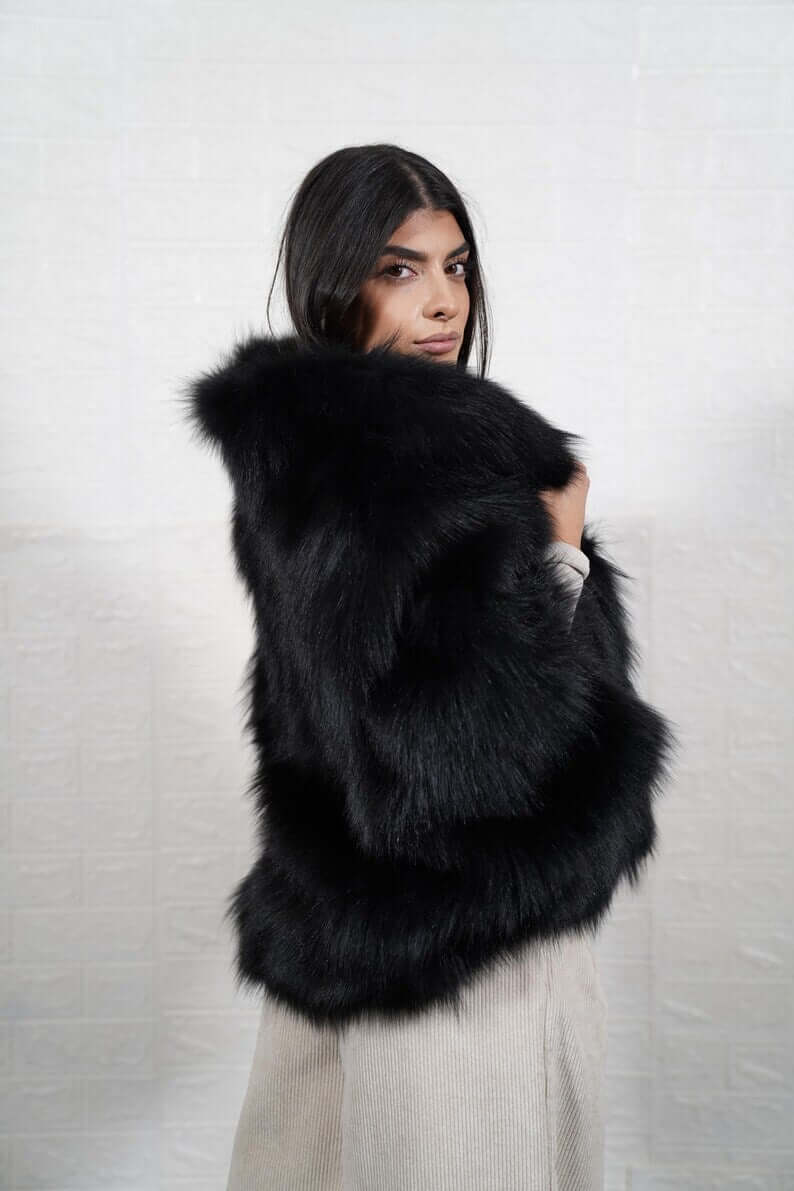 Fox Fur Cape Jacket Black with Collar - Tatifurs elegantly draped over a model's shoulders, showcasing its luxurious design.