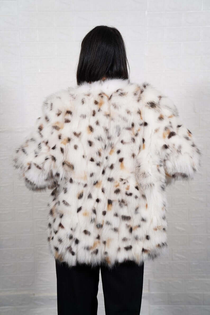Back view of white fox fur coat with leopard collar, TatiFurs
