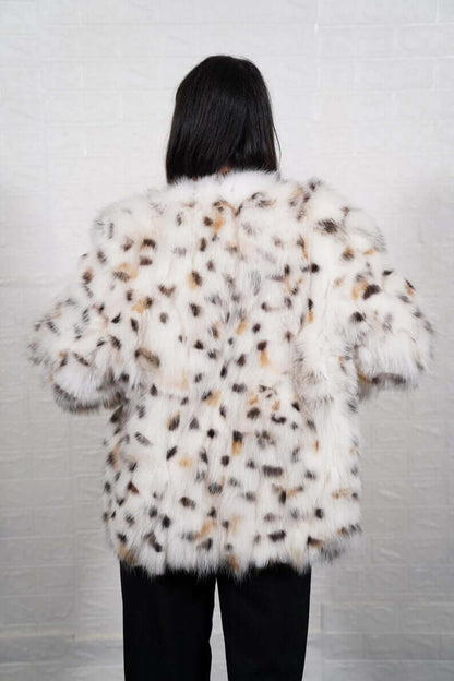 Back view of white fox fur coat with leopard collar, TatiFurs
