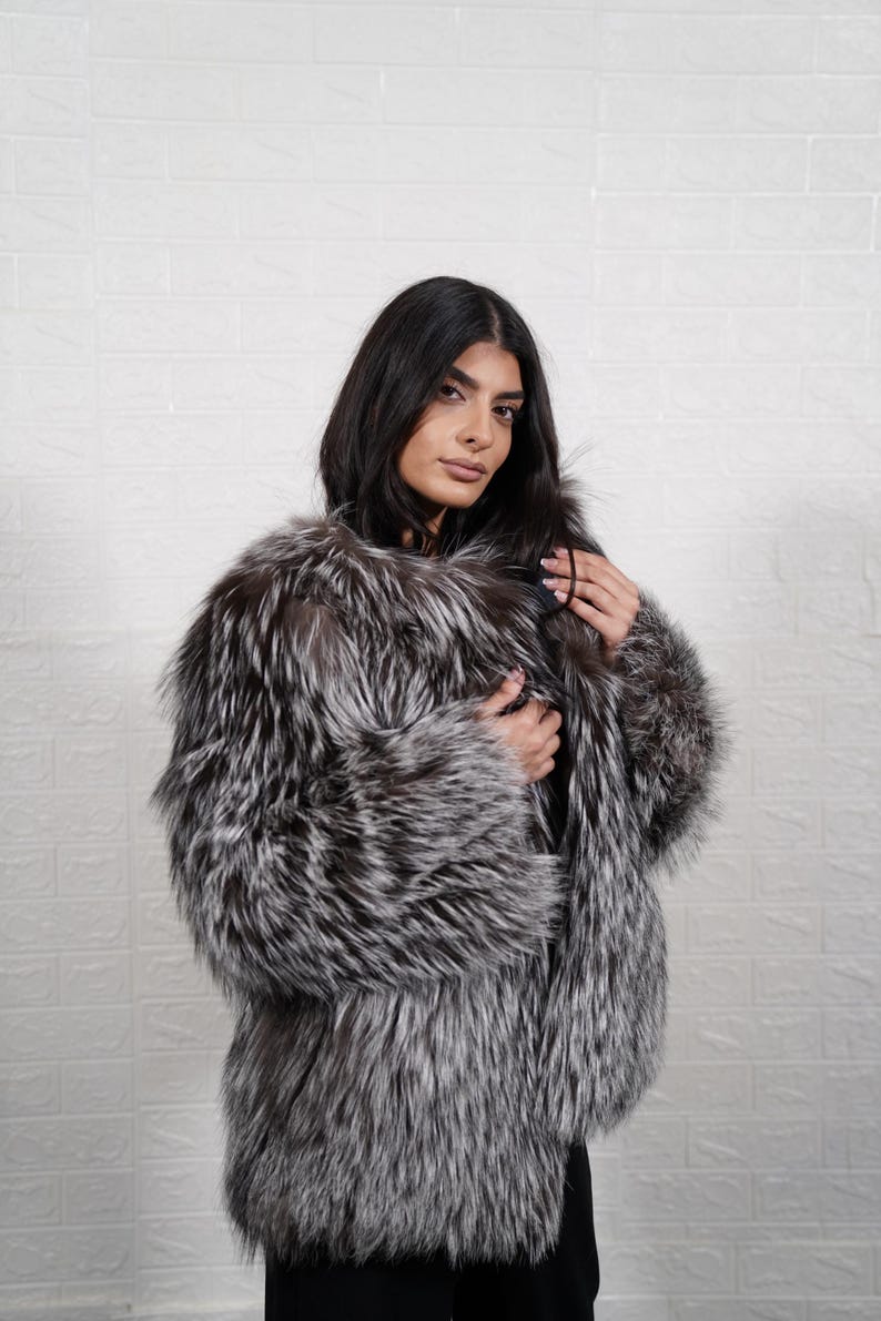 Close-up of real silver fox fur full skin pelts for premium quality
