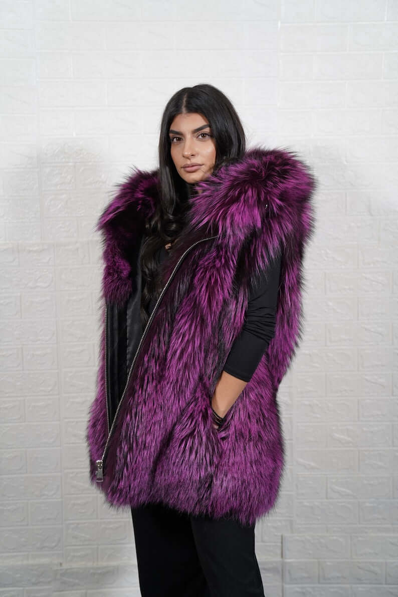 Close-up of purple and black full skin fox fur texture and hood detail
