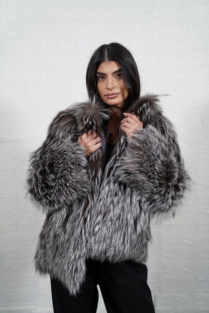 Side view of silver fox fur coat jacket – luxury winter fashion
