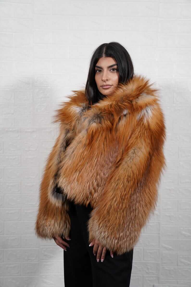 Statement piece golden fox fur skin short jacket with collar styled for winter
