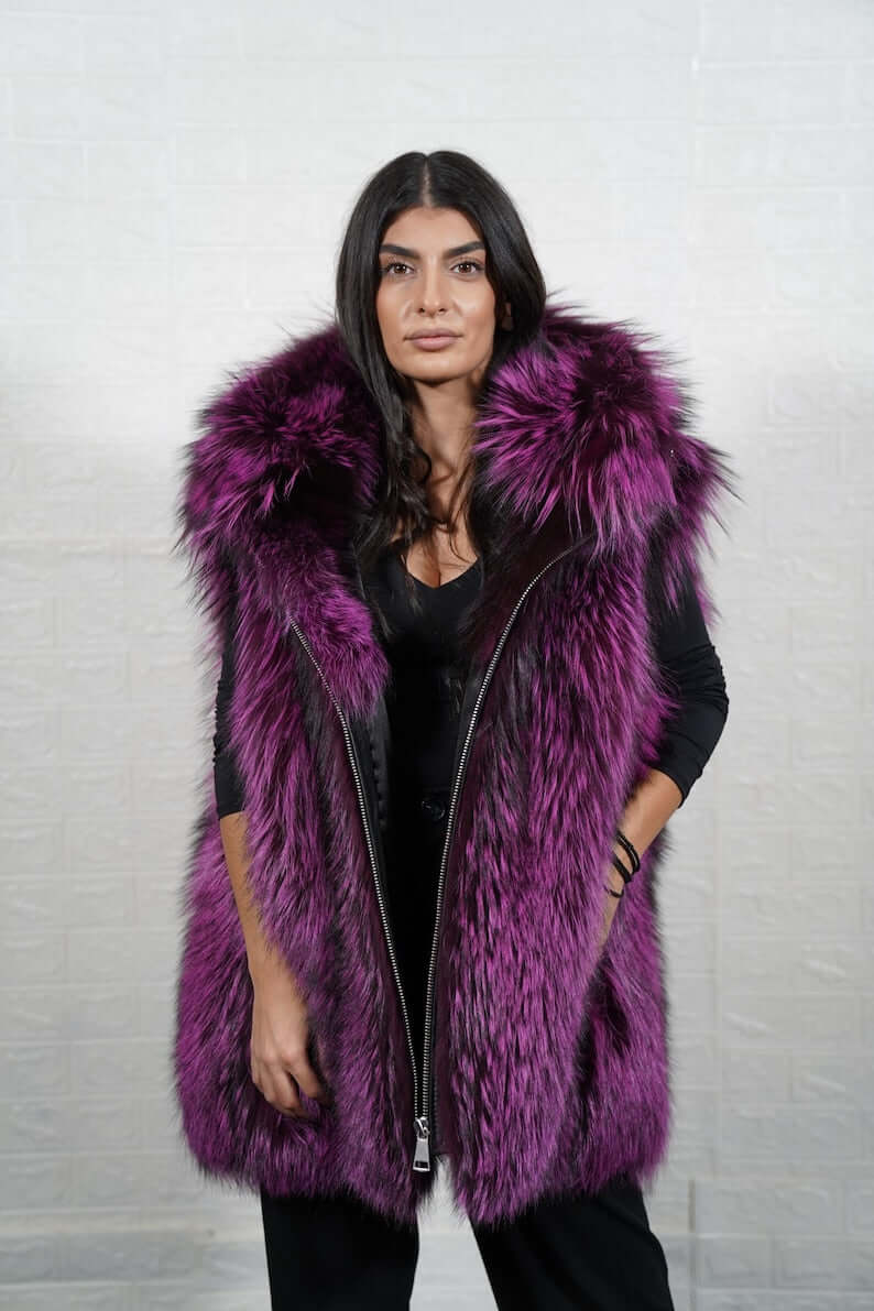 Detail shot of zipper closure on purple and black fox fur vest
