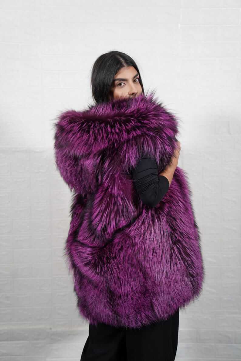 Purple and black fox fur vest styled for a bold festival or night out look
