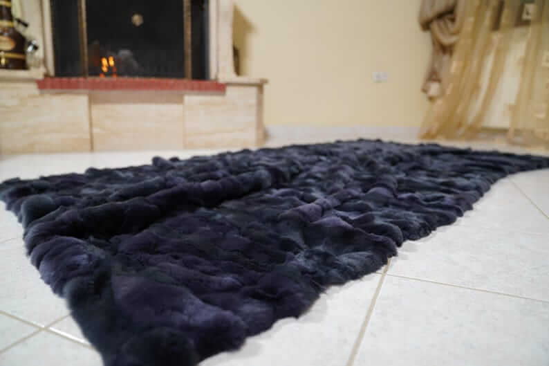 Double Sided Fur Rex Rabbit Blanket Throw Dark Blue laid out, showcasing its luxurious softness and deep midnight color.