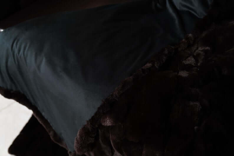 Rabbit Blanket Throw Rex Dark Brown - Tatifurs draped over a surface showcasing its rich color and soft texture.