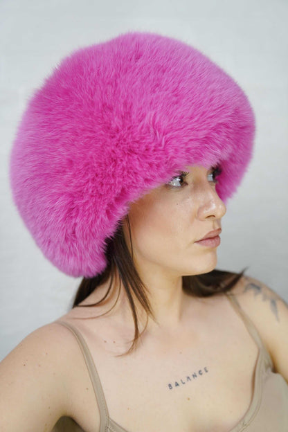 Fox Fur Hat Pink Full Skin - Tatifurs displayed on a model, vibrant fuchsia color for bold winter fashion.
