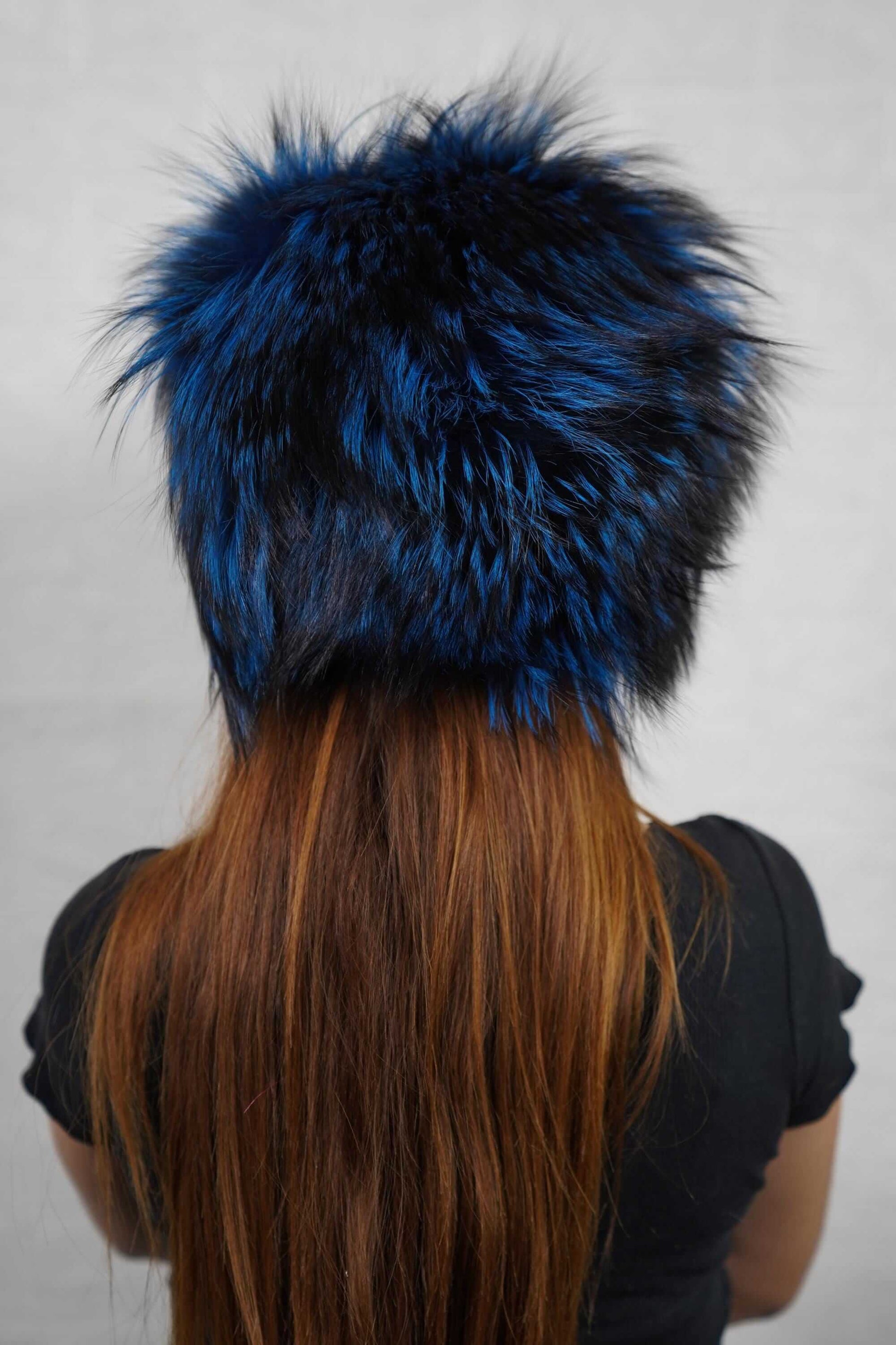 Fox Fur Hat Blue Black - Tatifurs worn by a model showing the back view of the luxurious fur design.