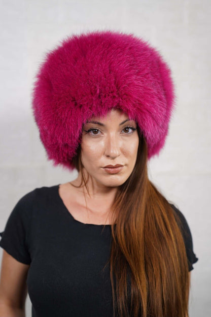 Fox Fur Hat Fuchsia Full Skin - Tatifurs worn by a model showcasing its vibrant color and luxurious texture.