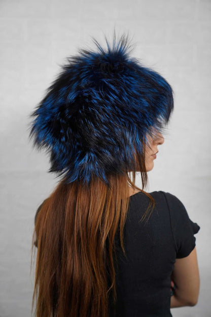 Fox Fur Hat Blue Black - Tatifurs worn by a woman showing the rich blue and black fur.