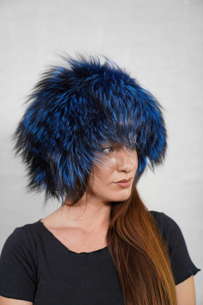 Fox Fur Hat Blue Black - Tatifurs worn by a model, showcasing its vibrant color and luxurious style.