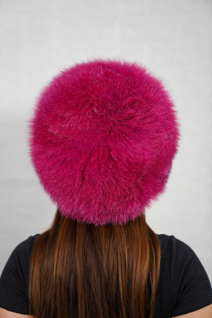 Fox Fur Hat Fuchsia Full Skin - Tatifurs worn from behind, showcasing vibrant pink color and luxurious fur texture.