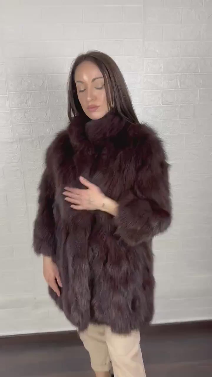 Brown fox fur coat styled for elegant winter wear