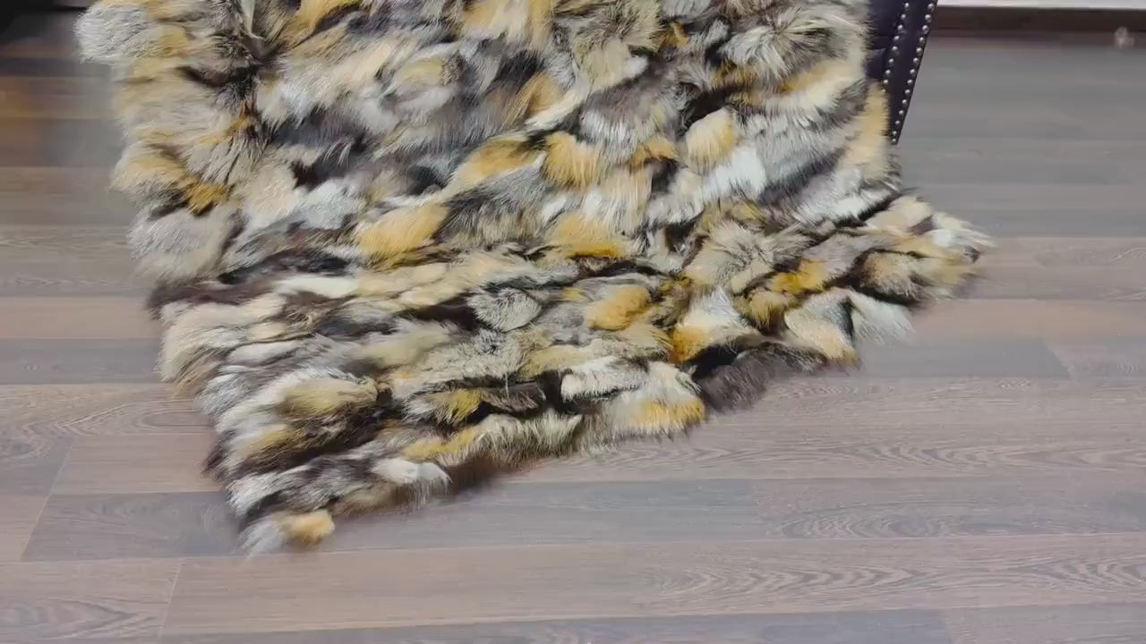 Fox Fur Blanket Throw Double Sided Gross Natural in orange, black, and silver hues on wooden floor.