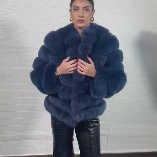 Fox fur jacket blue close-up texture showing full skin blue fox pile and horizontal leather strip construction between fur rows — Greek craftsmanship, TatiFurs
