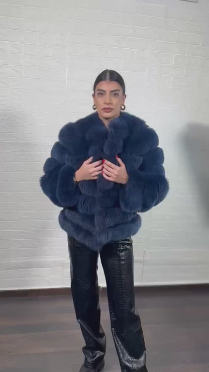 Fox fur jacket blue close-up texture showing full skin blue fox pile and horizontal leather strip construction between fur rows — Greek craftsmanship, TatiFurs
