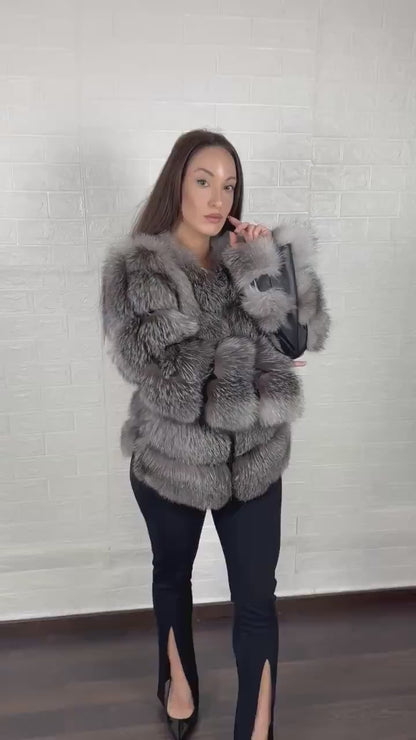 Jacket displayed on hanger with visible leather lines
