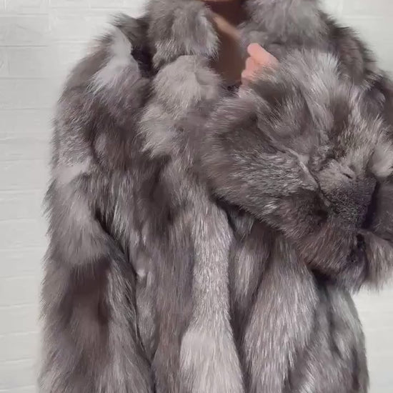 Fox fur jacket frost close-up texture showing natural frost fox pile depth and cool luminous silver grey tonal variation — Greek craftsmanship, TatiFurs
