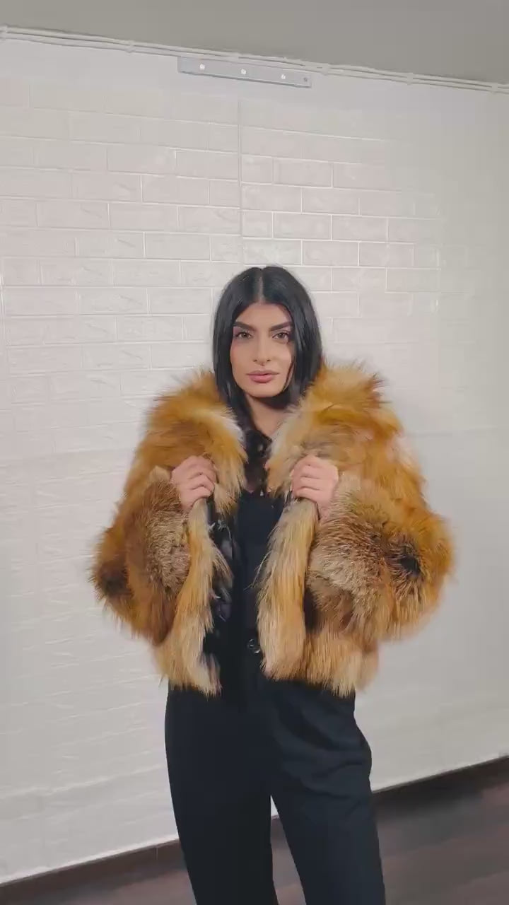 Model wearing golden fox fur skin short jacket with collar
