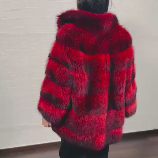 Raccoon fur jacket red black close-up texture showing full skin raccoon long pile depth and fierce red black tonal variation — Greek craftsmanship, TatiFurs
