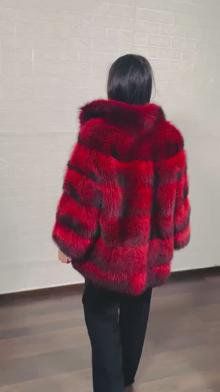 Raccoon fur jacket red black close-up texture showing full skin raccoon long pile depth and fierce red black tonal variation — Greek craftsmanship, TatiFurs
