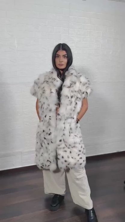 Fox fur vest white dalmatian women shown full length from front displaying collar frame short sleeves and button closure in natural spotted white fox — Greek craftsmanship, TatiFurs
