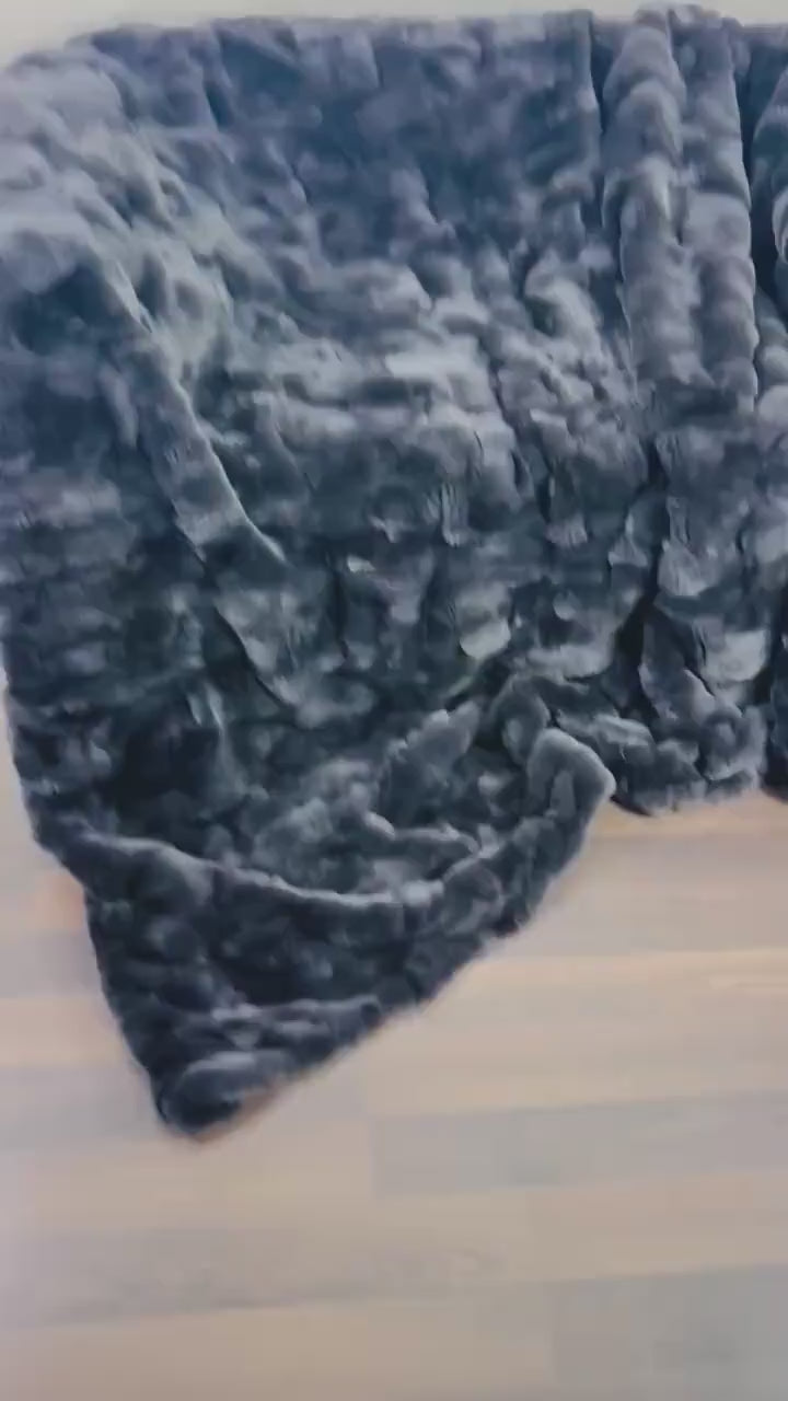 Rabbit Blanket Throw Rex Gray - Tatifurs displayed on a wooden floor showcasing its plush texture.