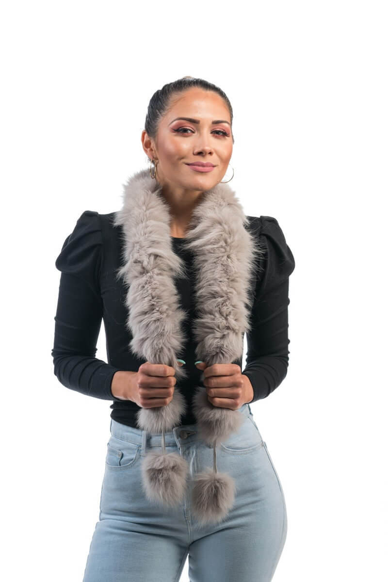 Fox Fur Scarf Gray - Tatifurs displayed on model, featuring soft gray fox fur and playful pom poms.