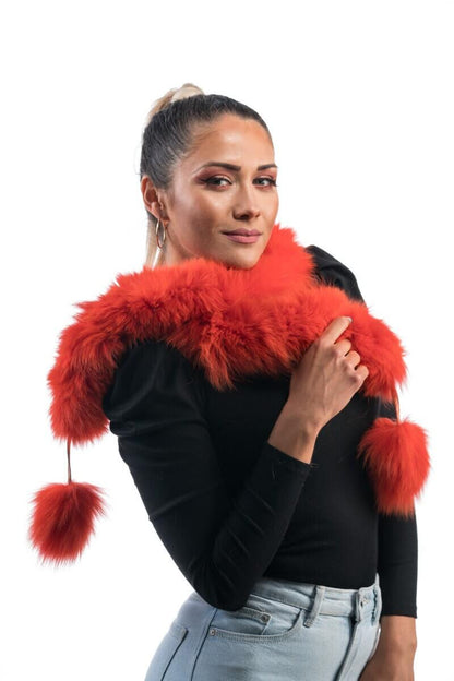 Orange Fox Fur Scarf with Pom Poms - Tatifurs worn by model, showcasing vibrant color and playful design.