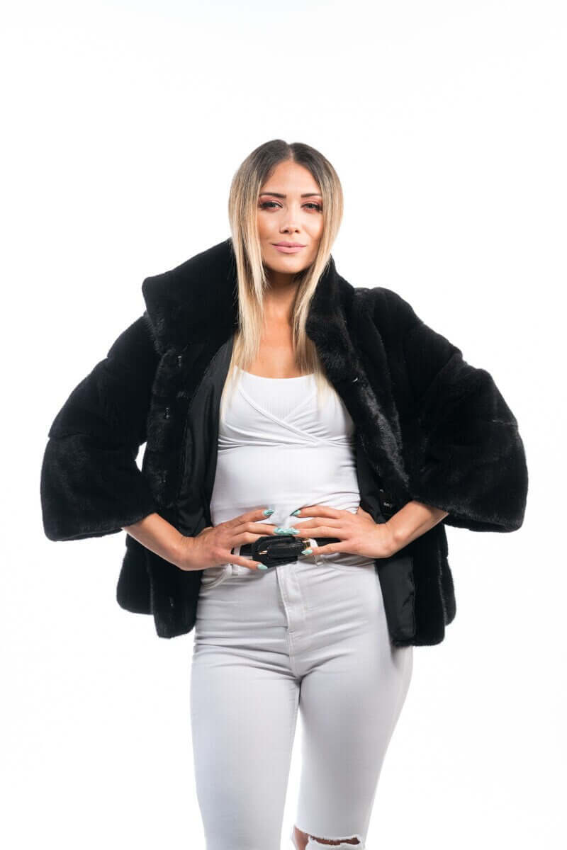 Mink Fur Jacket Black with collar - Tatifurs modeled by a woman, showcasing its elegant and commanding style.