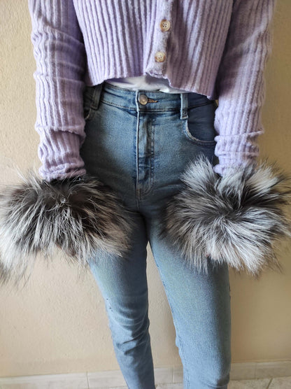 Natural Silver Fox Fur Cuffs - Tatifurs worn on hands with a stylish outfit, showcasing luxurious silver fox fur.