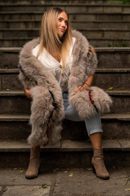 Fox Fur Scarf Long Gray Colorful Line - Tatifurs worn by a model sitting on stairs with stylish outfit.