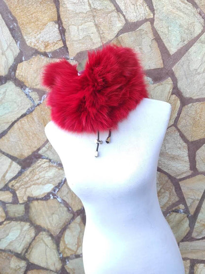 Red Fox Fur Neck Warmer Scarf - Tatifurs displayed on a mannequin against a natural stone background.