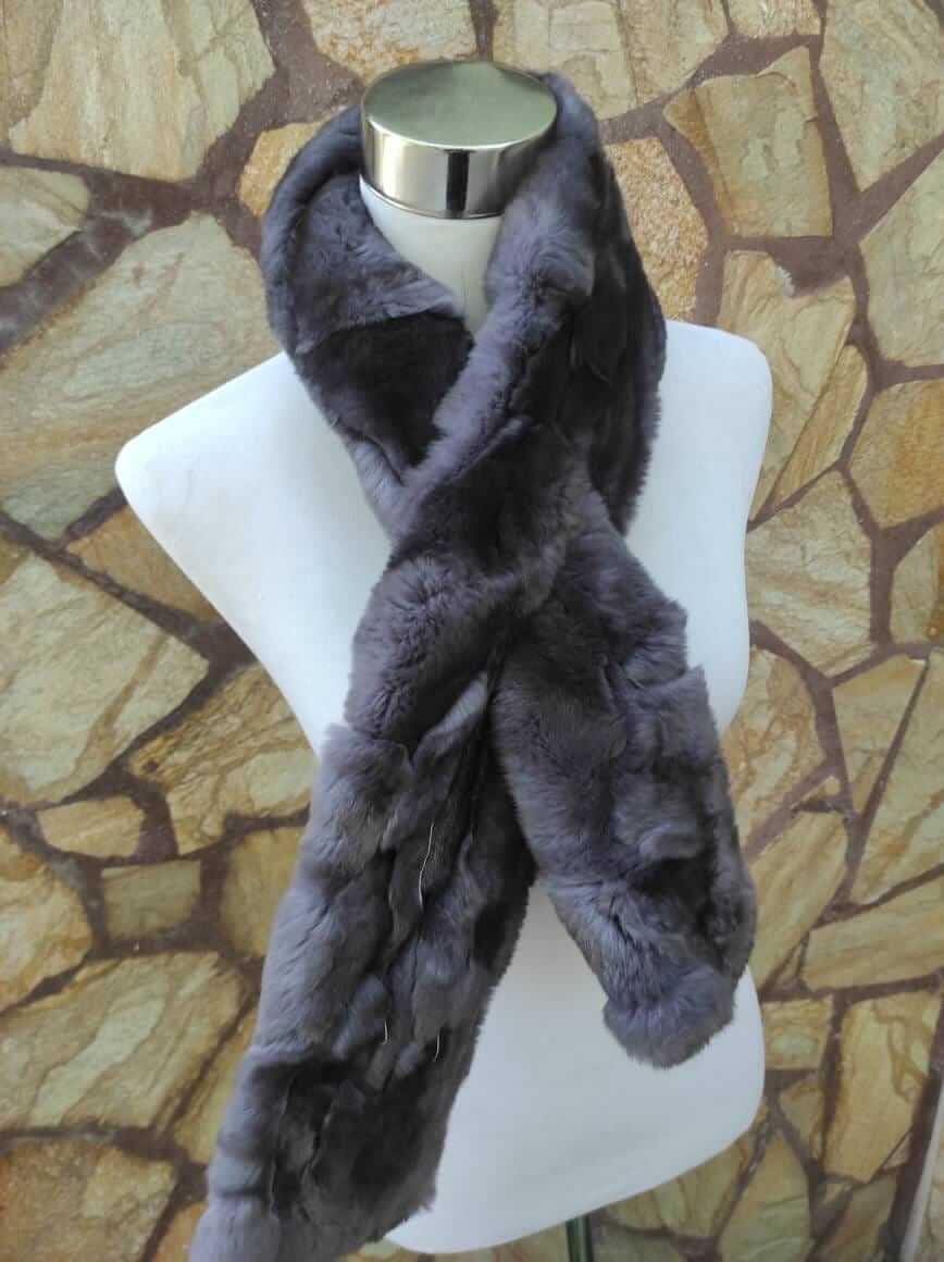 Rex Rabbit Fur Scarf Gray - Tatifurs displayed on a mannequin against a stone background.